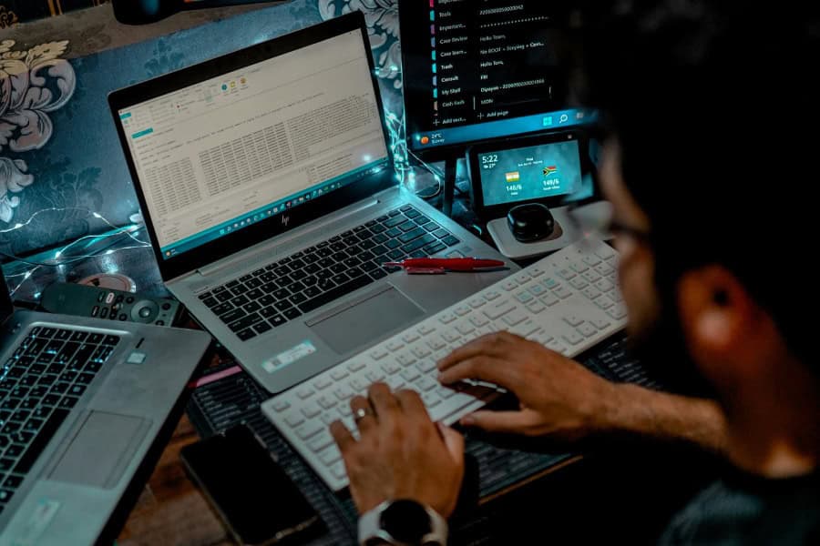Picture of an IT expert looking for any vulnerability in the system that can be reinforced