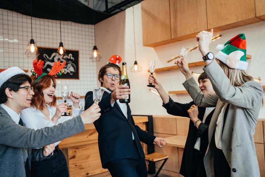 Picture of happy coworkers celebrating the holidays