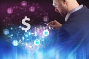 A businessman is using a virtual screen with a graphic of a dollar symbol against a futuristic background